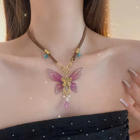 #20 collier papillon violet vintage