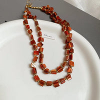 53# Collier-Café-Robe asymétrique