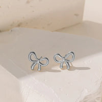 YC [G3085] Bow Stud Earrings [Steel Color]]