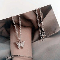 Collier papillon simple couche (plaqué or blanc)