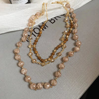 47# Collier-Café-Superposé