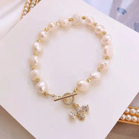 Or 18 carats (perle d'eau douce)
