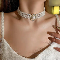 7# Necklace. Golden Three-Layer Pearl.