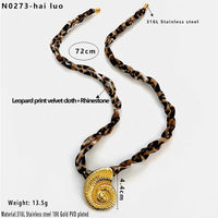 Golden Leopard with Diamond Knotted Conch