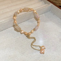 23# Jonc de bambou rose (Perle d'eau douce)