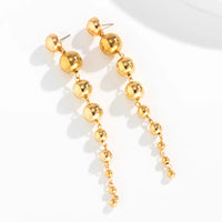 Boucles d'oreilles en or (même style)