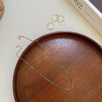 Collier perlé de sucre doré