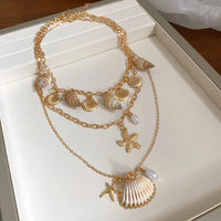 27# Collier-Doré/1,3*1,1cm-Coquillage