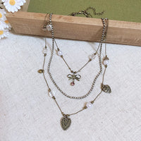 55# Collier-Épingle à cheveux bronze/44*15mm-Cœur rouge