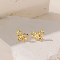 YC 【G3035】 bow stud earrings [gold]]